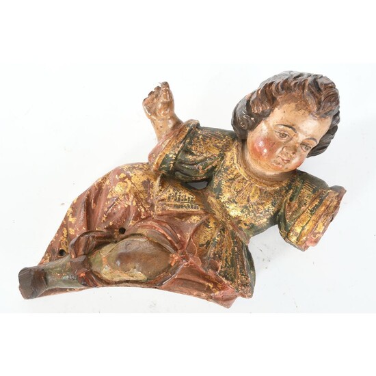 ELEMENT en bois sculpté à belle patine polychrome et dorée représentant un ange. (Accidents et...