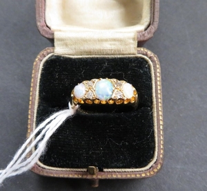 Edwardian opal and diamond ring 18ct gold - good clear hallm...