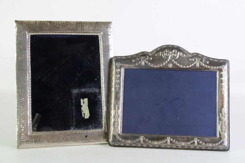 English Hallmarked Sterling Silver frame (W22cm x 19.5cm) together with a 925 silver example (H23cm x18.5cm)