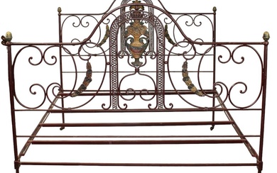 French wrought iron bed with flowering urns