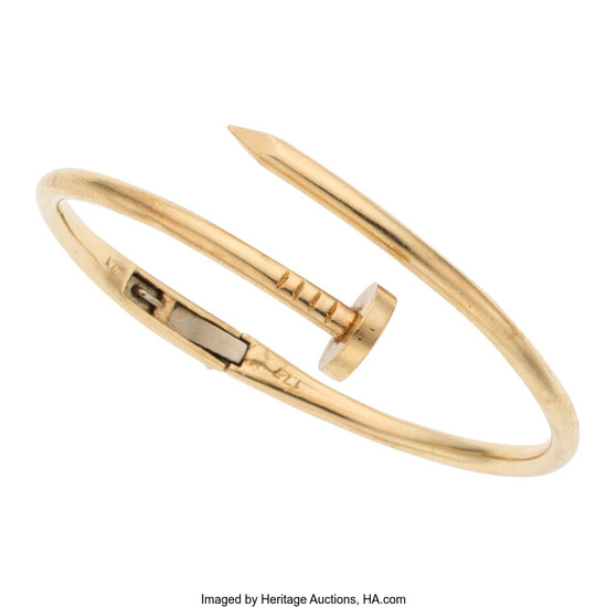 Gold Bracelet The hinged 14k gold nail bracelet weighs...