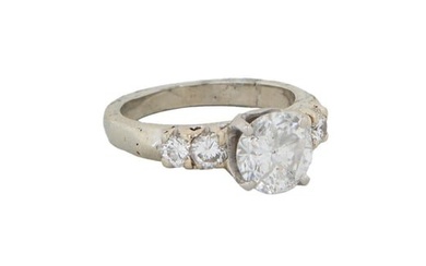 Lady's Platinum Diamond Dinner Ring, with a 1.65 carat round center diamond, atop a diamond mounted