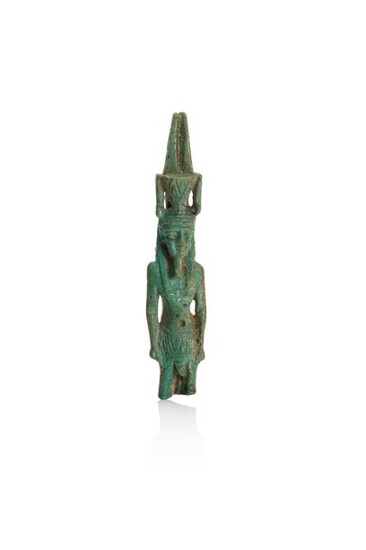 Large amulet representing the God Nefertum standing with his arms along his body.
