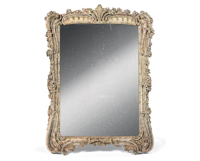 Large mirror in a wooden frame partially gilded...
