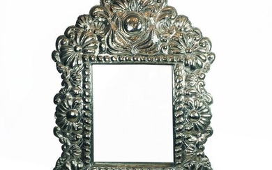 Large wooden frame covered in Bolivian silver embossed