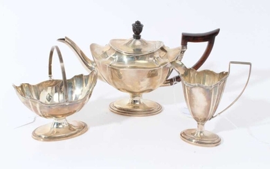 Late Victorian silver three piece bachelor's tea set of navette form, the teapot with ebony finial and angular handle, raised on oval pedestal foot