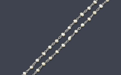 Long chain in platinum with pearls.