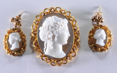 Matching cameo brooch and earrings. 14k yellow gold