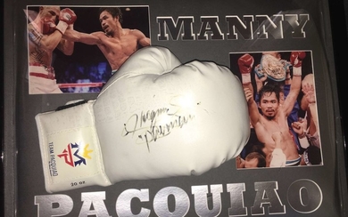PACQUIAO MANNY: (1978- ) Filipino professional Boxer and Politician. Widely considered one of the gr...