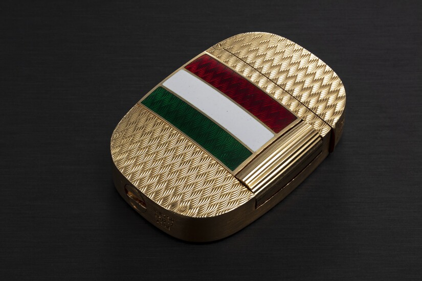 PATEK PHILIPPE, GOLDEN ELLIPSE REF. 9512-1, A GOLD LIGHTER WITH ‘KHANJAR’ AND ENAMEL MADE FOR THE SULTANATE OF OMAN