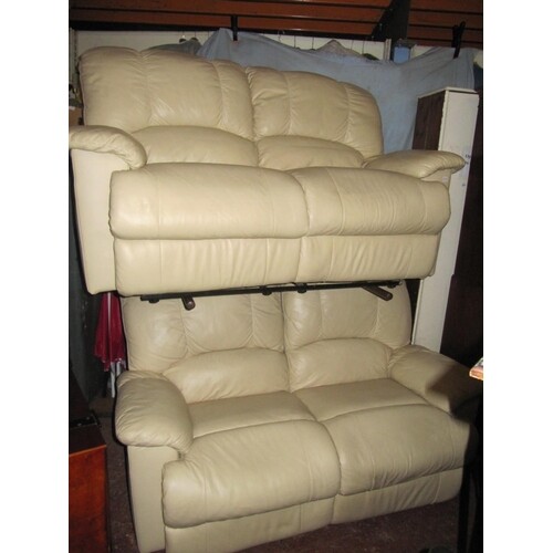 Pair of Cream Two Seater Recliner Sofas.