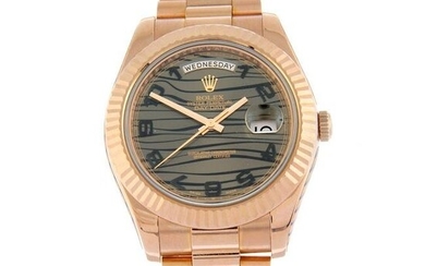ROLEX - an Oyster Perpetual Day-Date II bracelet watch. Circa 2022. 18ct rose gold case with fluted