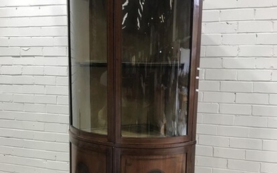 Sheraton Style Mahogany Corner Display Cabinet, with two bent glass panel doors, the lower doors with oval flame panels on satinwood...