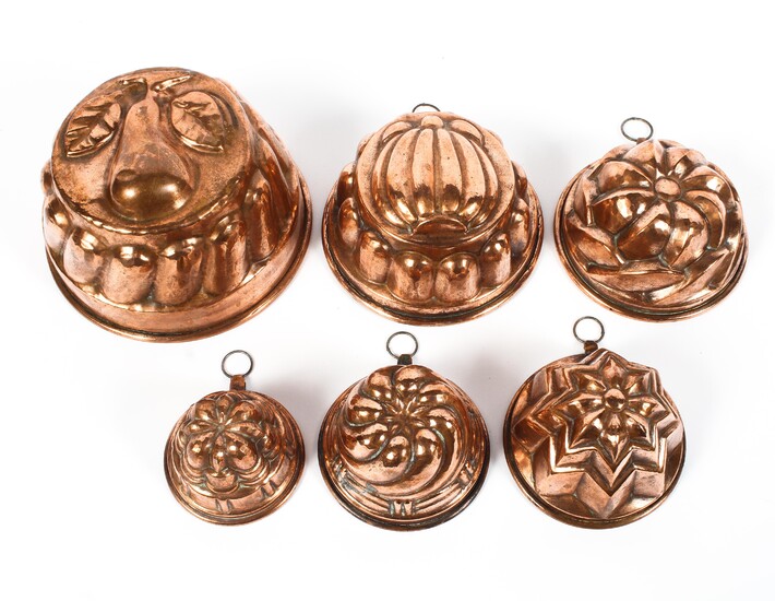 Six Victorian copper jelly moulds