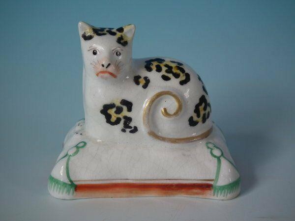 Staffordshire Pottery Cat on Cushion