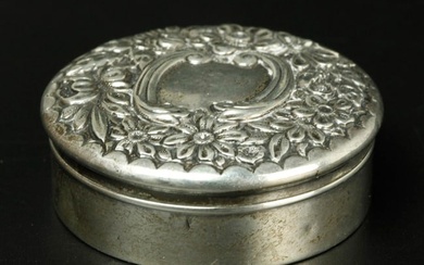 Sterling silver box by Gorham with a floral repousse lid