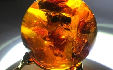 Stunning Vintage Amber Ball with inclusion on a