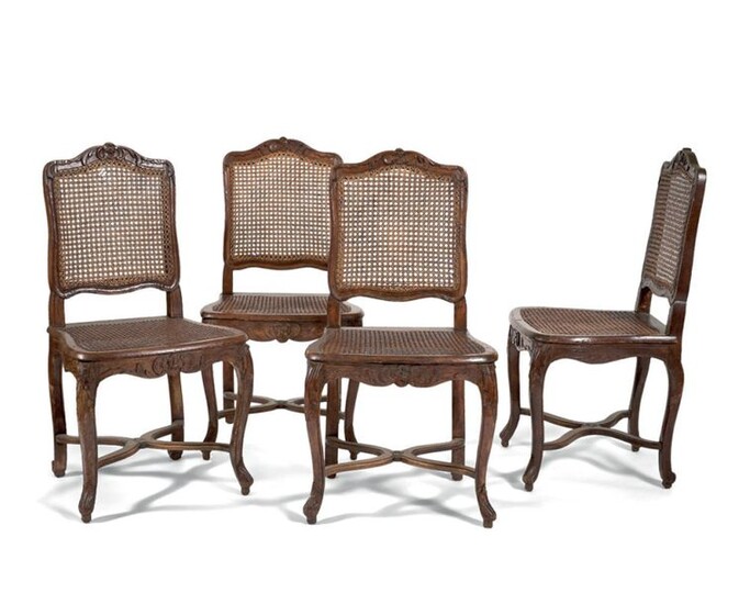 Suite of four dining room chairs in waxed natural wood....