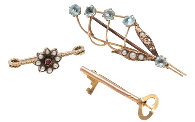 THREE ANTIQUE BROOCHES; 9ct key and Lilly of the Valley set with faux pearls and blue stones, damaged wt. 3.13g, plus a gilt brooch...