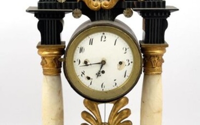 Temple-form clock in ebonized wood with alabaster columnsVienna, mid 19th centurycircular dial with Arabic numeration, cimasa with officer portrait; small defects and restorations60 x 3 1 cm