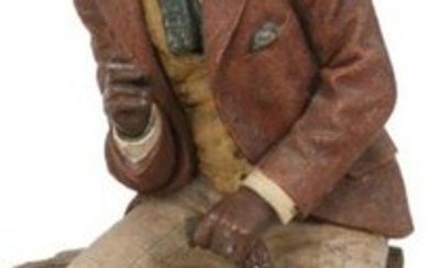 Terracotta Figure of a Black Man with Straw Hat