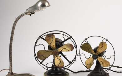 Two Small Desk Fans and a Chrome Lamp.