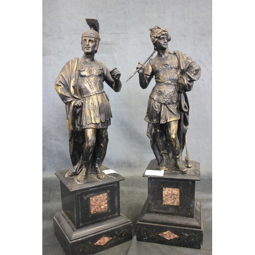 Two gilded spelter figures of stylised soldiers on black sla...