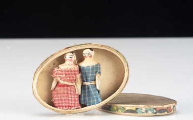Two miniature Grodnerthal dolls’ house dolls in an oval cardboard box