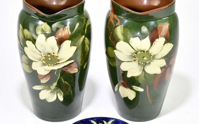 WATCOMBE; a pair of vases decorated with flowers, together with...