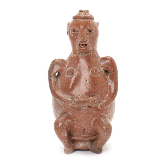 Western Mexico seated naked woman figure of red fired clay with hat, hands holding on stomach. 800–1500. H. 19 cm.