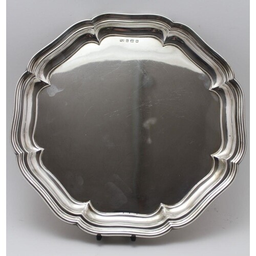 Williams Adams Ltd. A Georgian design silver salver with pie...