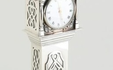 silver standing watch
