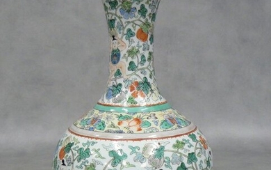 A Chinese porcelain vase decorated with eight figures in various...