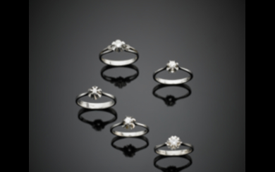 Lot of five white gold diamond solitaire rings of...