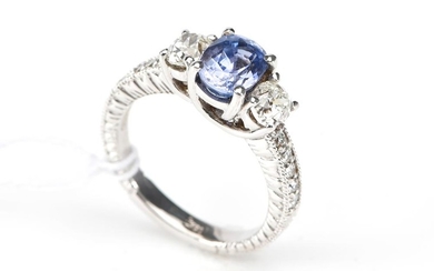 A SAPPHIRE AND DIAMOND RING, SAPPHIRE WEIGHING 1.93CTS AND DIAMONDS TOTALLING 1.16CTS.