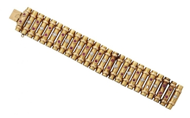 A 20th century gold, Egyptian bracelet, designed...