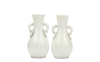 A PAIR OF CHINESE BLANC-DE-CHINE VASES. Qing Dynasty,...