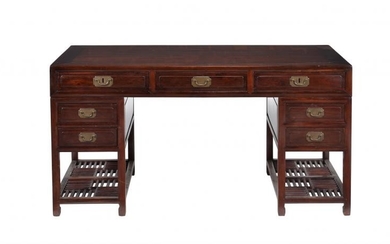 A Chinese hardwood pedestal desk