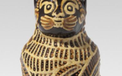 AN ENGLISH SLIPWARE CAT JUG, PROBABLY FIRST HALF OF THE 18TH CENTURY, STAFFORDSHIRE