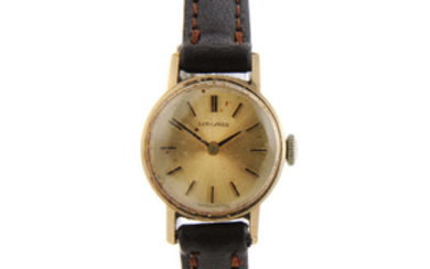 LONGINES - a lady's 9ct yellow gold wrist watch.
