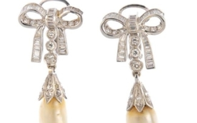 A pair of natural pearl and diamond earrings. Each