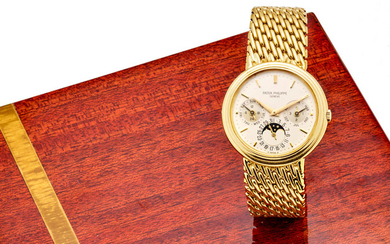 Patek Philippe. A fine 18K gold automatic bracelet watch with perpetual calendar and moon phase