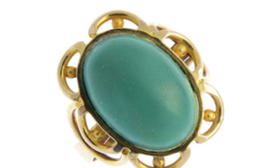 A reconstituted turquoise single-stone ring
