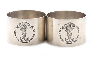 A pair of silver napkin rings, by Elkington...