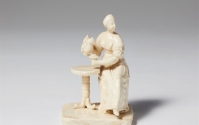 A small Zurich stoneware figure of a lady dri ...