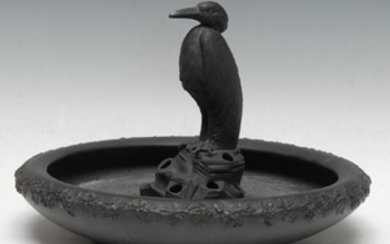 A Wedgwood basalt egret heron centrepiece, the bowl in