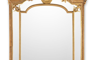 A French late 19th/ early 20th century carved giltwood and gesso overmantle mirror