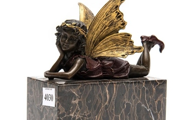 A BRONZE OF A FAIRY ON A MARBLE BASE
