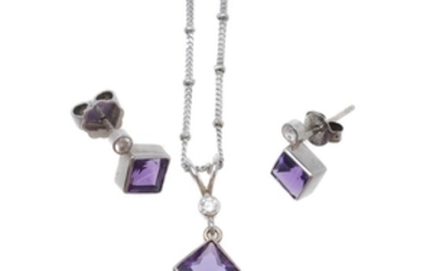 An amethyst and diamond pendant and ear studs