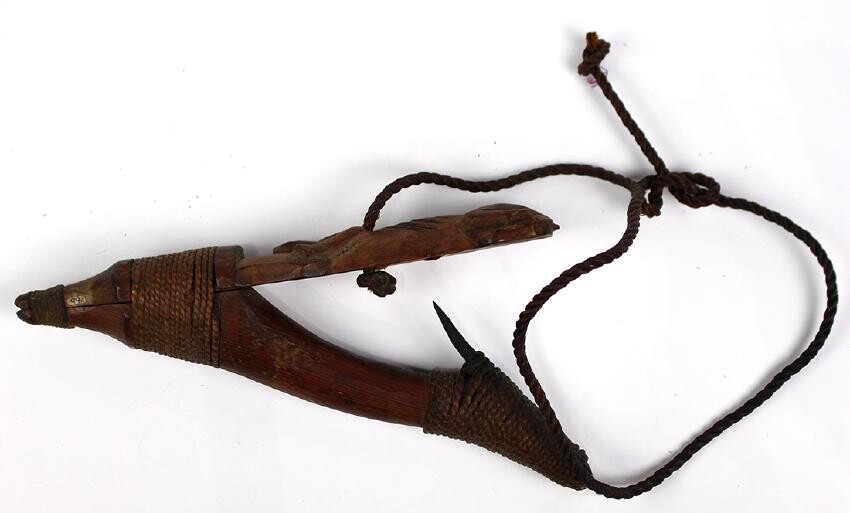Tlingit cedar carved wood fishing hook, 19th century